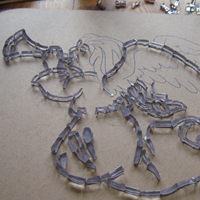 tracing detail of mosaic angel