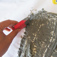 grout edges of mosaic board