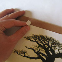 use masking tape to tape design onto board