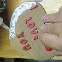 glue border of heart mosaic