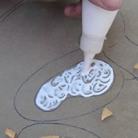 wood glue an area of the mosaic