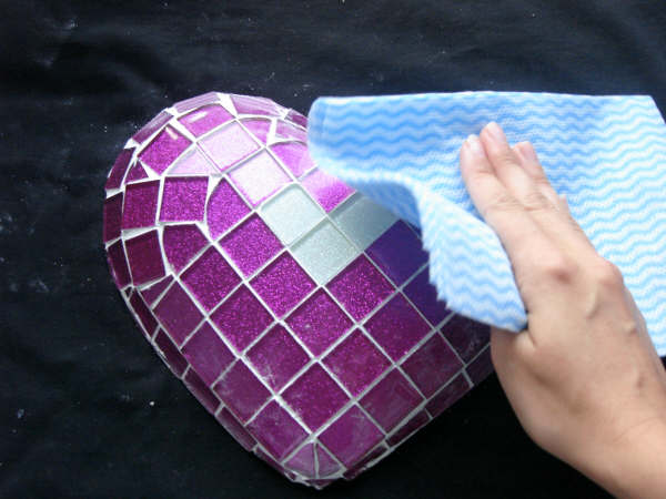 wipe off excess mosaic grout