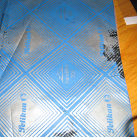 place carbon paper over design to be traced