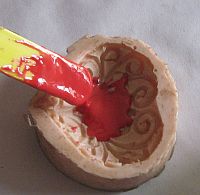 add teaspoon resin and catalyst