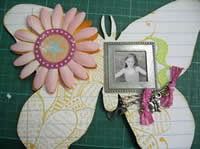 stick photo onto scrapbook frame