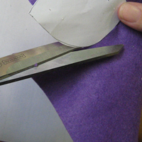 cut felt petals using scissors