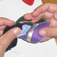add stuffing to felt ball