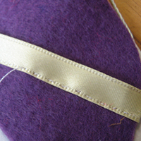 sew ribbon using tacking stitch