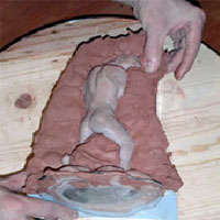 remove teh moulding clay from the silicone mould