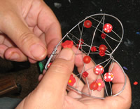 wrap wire and secure to heart