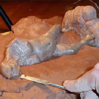smoothing out the clay