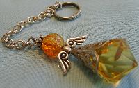 show off angel keyring