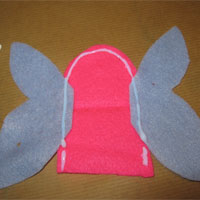 glue along edges of the fairy's body