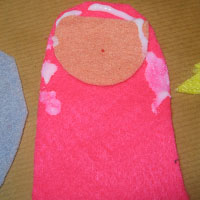 glue felt fairy face onto body