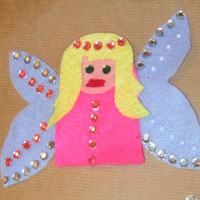 glue sequin wing decorations into place