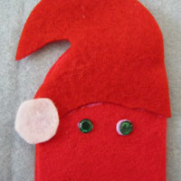 glue white felt to create hat for father christmas
