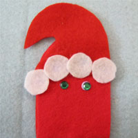 create a hat for santa using white felt circles