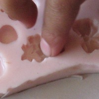press crazy clay into mould