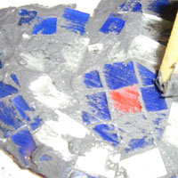 push grout in gaps