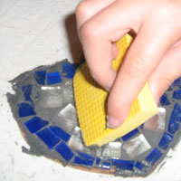 spread grout with foam sponge