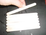 glue 7 sticks long side together in a row