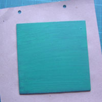 paint the chipboard base and leave to dry