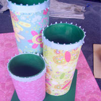 stick recycled toilet rolls onto chipboard base