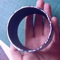 cover bottom recycled cardboard tube with clear drying glue
