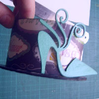 add embellishments using glue or double-sided tape
