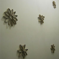 compelted recycled flowers on wall