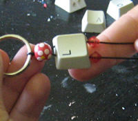 thread beads onto string