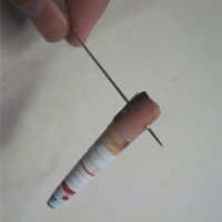 stick pin through bead