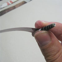 roll paper into a spiral