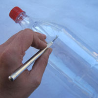 cut on ridge of coke bottle