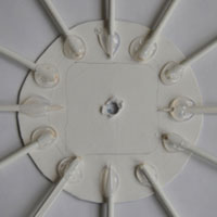 glue bottle lids for clock numbers in place