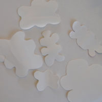 cut plastic shapes from plastic milk bottle