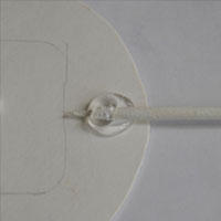 glue skewer onto clock centre piece