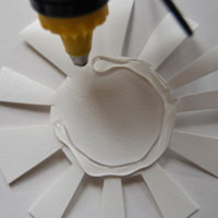 place glue on plastic milk bottle cutout