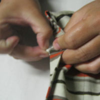 pull cord through the recycled shopping bag