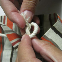 untie cotton handles on shopping bag