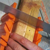 saw wood using miter box